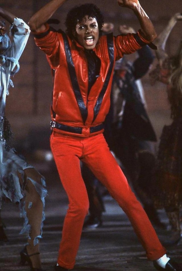 Michael Jackson wearing his iconic red jacket from the Thriller music video